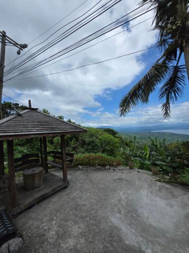 a gazebo with a view of the mountains at Simoy Staycation Tagaytay in Tagaytay