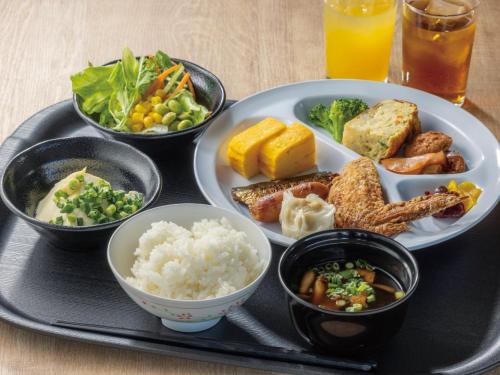 a tray with a plate of food with rice and vegetables at Tokai City Hotel - Vacation STAY 83890v in Tokai