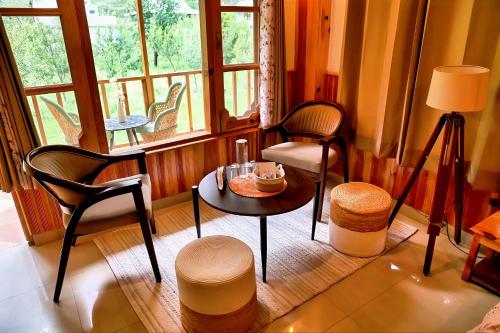 Zona de estar de Boho Grove Cafe & Stay, Tirthan Valley