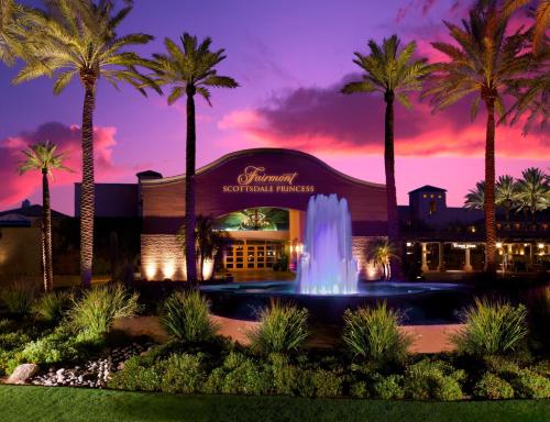 a large fountain in front of a large building at Fairmont Scottsdale Princess in Scottsdale