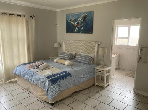 Postel nebo postele na pokoji v ubytování Palm Sands Beach House - 22 sleeper
