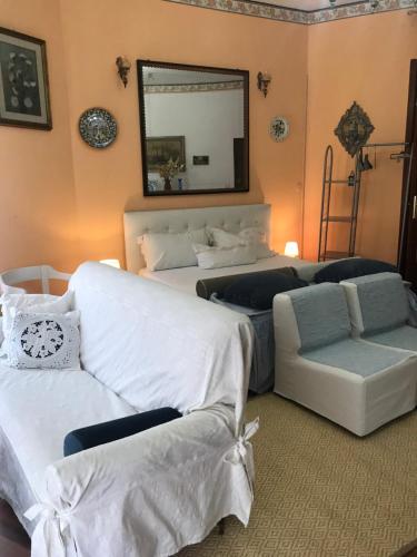 Ένα ή περισσότερα κρεβάτια σε δωμάτιο στο Casa Mantegna