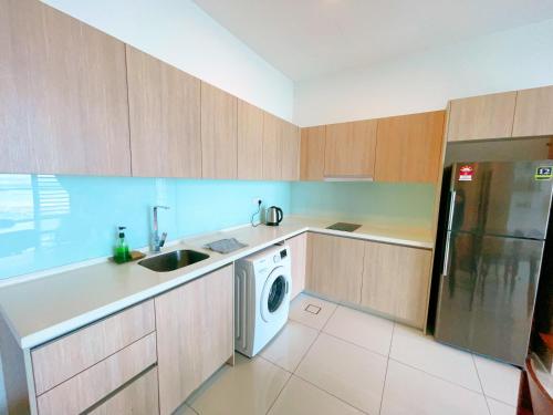 Η κουζίνα ή μικρή κουζίνα στο GYDEN STAYCATION #Green Haven near Senibong&Regency