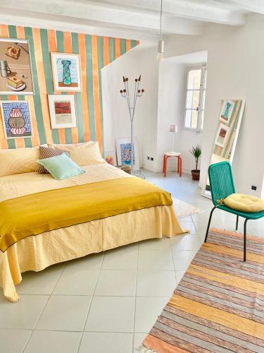 Postel nebo postele na pokoji v ubytování Casa Curiè 17 in borgo storico