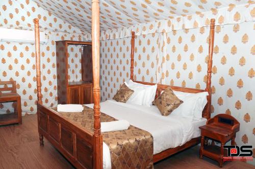 Postel nebo postele na pokoji v ubytování Siya Resort - Ram Janmabhoomi Ayodhya