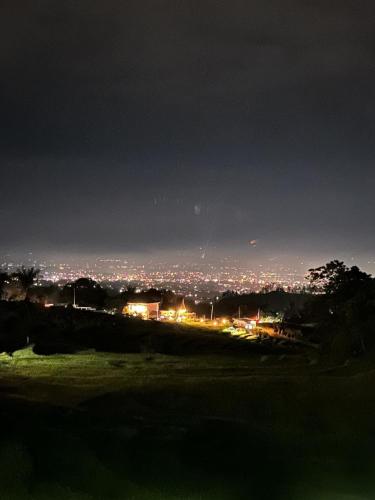 a view of a city lit up at night at Ikua Tanjuang in Situjuhbatul