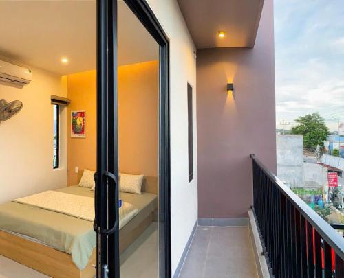 Postel nebo postele na pokoji v ubytování Nguyễn Tân Homestay Near Beach BBQ Free Mỹ Tân