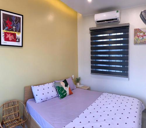 Postel nebo postele na pokoji v ubytování Nguyễn Tân Homestay Near Beach BBQ Free Mỹ Tân