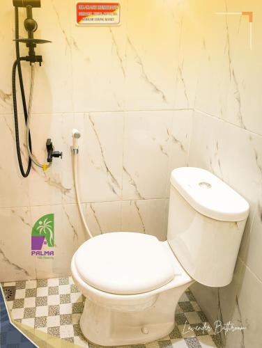 Ένα μπάνιο στο Palma Lavender Room Klaten