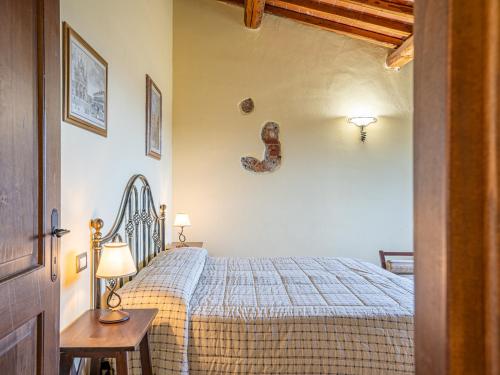 Postel nebo postele na pokoji v ubytování Antico Borgo Poggiarello