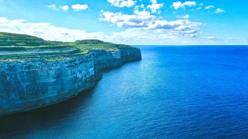 an aerial view of a large body of water at Casa Palma Gozo in Għarb