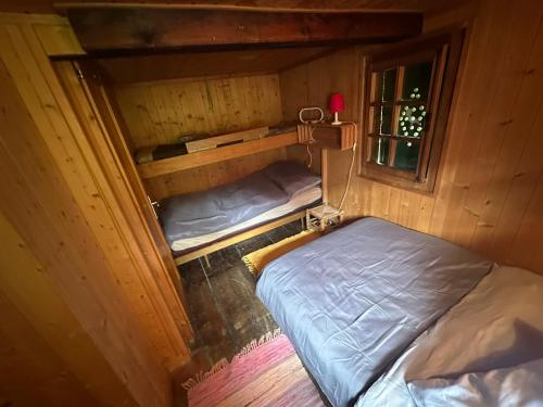 an overhead view of a bedroom with two beds at Cozy little chalet in a perfect location! in Champéry