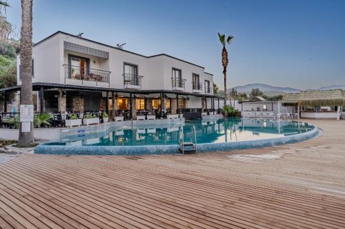 Bazén v ubytování Amilla Beach Resort Bodrum - All Inclusive nebo v jeho okolí