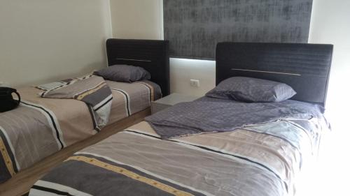 Giường trong phòng chung tại The Mountain House