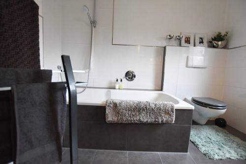 Ένα ή περισσότερα κρεβάτια σε δωμάτιο στο Cozy apartment in Siegen