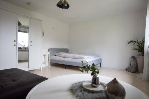 Ένα ή περισσότερα κρεβάτια σε δωμάτιο στο Cozy apartment in Siegen