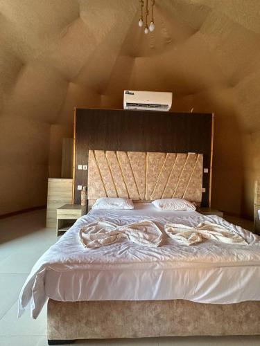 Postel nebo postele na pokoji v ubytování camp Sam Wadi Rum