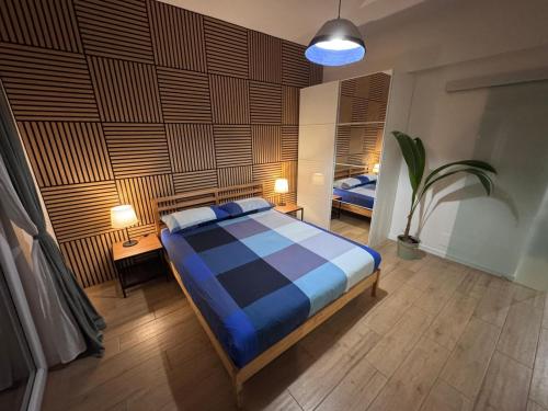 Postel nebo postele na pokoji v ubytování Occhi sul mare Apartment