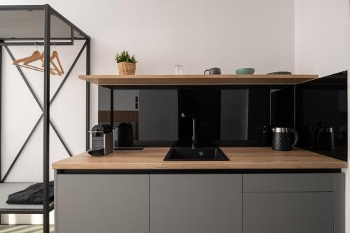 Kuchyň nebo kuchyňský kout v ubytování Amara suites