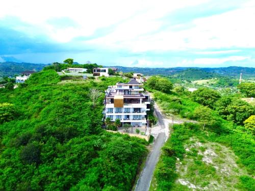 an aerial view of a building on a hill at Truntum Boutique Mandalika in Kuta Lombok