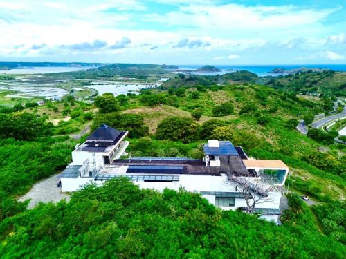 an aerial view of a house on a hill at Truntum Boutique Mandalika in Kuta Lombok