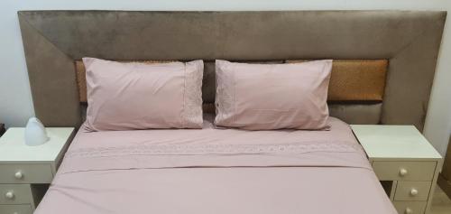 Ένα ή περισσότερα κρεβάτια σε δωμάτιο στο Aerostay Jamal