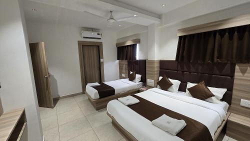 Gokul Guest Houseにあるベッド