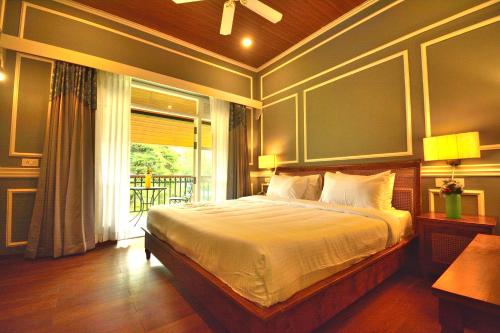 Katil atau katil-katil dalam bilik di The Tredis Heritage by the Lake