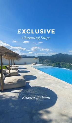 a resort with a swimming pool and the words excellence changing stays at Exclusive Pena Rio in Ribeira de Pena