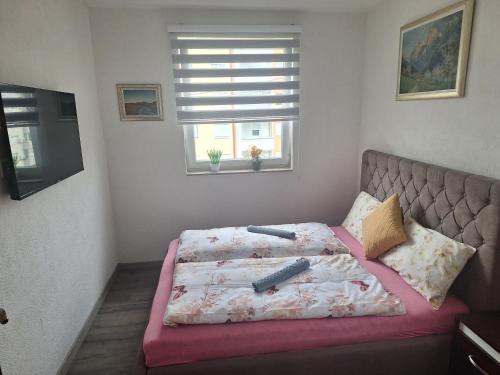 Postel nebo postele na pokoji v ubytování Apartmani Villas
