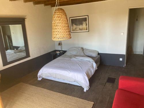 Ένα ή περισσότερα κρεβάτια σε δωμάτιο στο Vakantiehuis in groene oase
