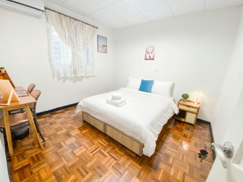 Katil atau katil-katil dalam bilik di Little Courtyard Inn