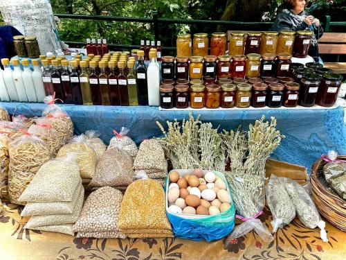 a table filled with lots of different types of food at SeaTerra Boutique suite in Kalamos