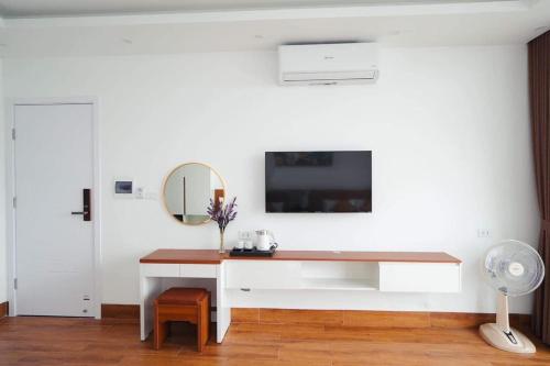 Μια τηλεόραση ή/και κέντρο ψυχαγωγίας στο Realux Hotel