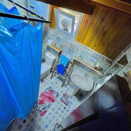 a bathroom with a sink and a toilet at Skyrock Dahab in Dahab