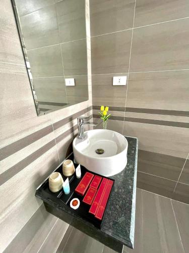 Ένα μπάνιο στο Realux Hotel