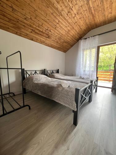 Postel nebo postele na pokoji v ubytování Eva Grand House Dilijan
