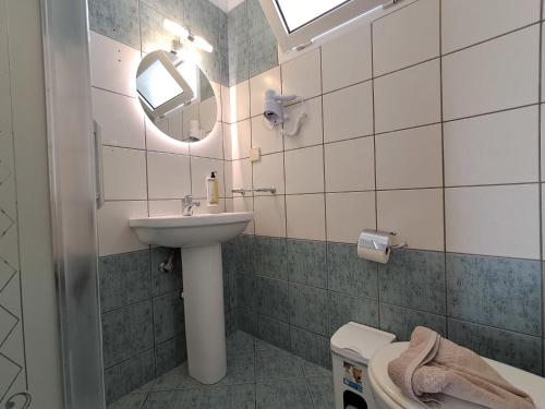 Ένα μπάνιο στο Sigma Hotel