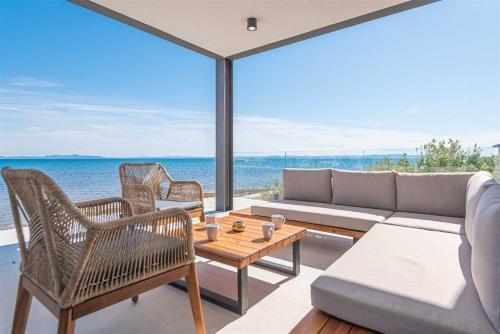 Villa Serena Luxury Seafront Escape with Pool