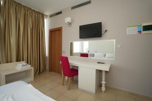 TV a/nebo společenská místnost v ubytování Sun Hotel