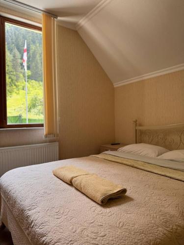 Ein Bett oder Betten in einem Zimmer der Unterkunft Hotel forest echo