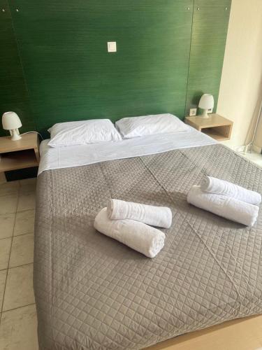 Ένα ή περισσότερα κρεβάτια σε δωμάτιο στο Alexandra Sunshine Apartments
