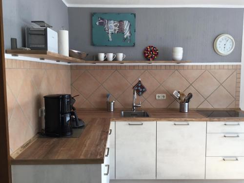 Η κουζίνα ή μικρή κουζίνα στο Mosel-Appartements Nehren