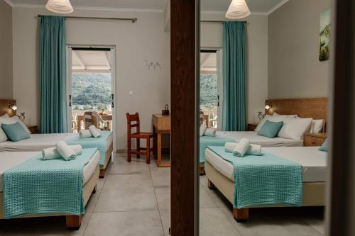 Voodi või voodid majutusasutuse Elia Studios Zakynthos toas