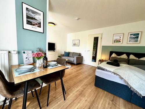 Foto Gemütliches 1R Apartment mit Balkon, Parking, TV Streaming 1