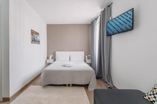 Postel nebo postele na pokoji v ubytování Franciacorta Rooms 1