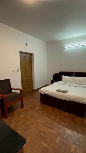 Ένα ή περισσότερα κρεβάτια σε δωμάτιο στο Amarah Homestay