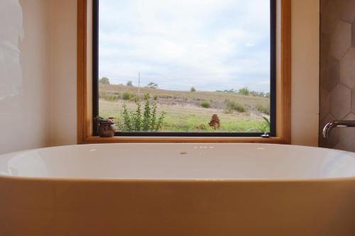 Φωτογραφία από το άλμπουμ του Huon Heights Hideaway at Cygnet Coast σε Cradoc