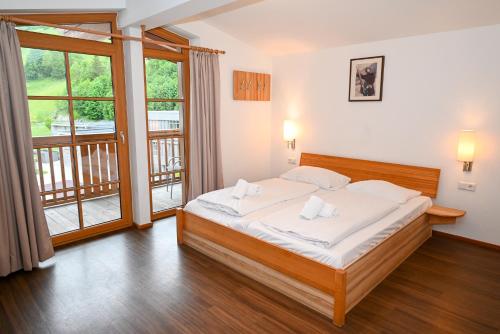 Posteľ alebo postele v izbe v ubytovaní Appartementhaus Kristall incl Joker Card by All in One Apartments