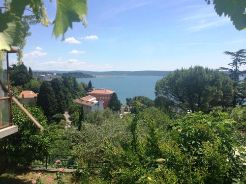 a view of the lake from a house at Apartments and Rooms Knez in Portorož